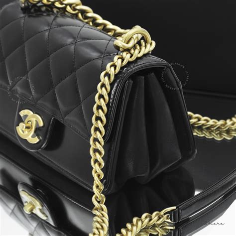 chanel seasonal navy bag gold hardware|Chanel bags with gold hardware.